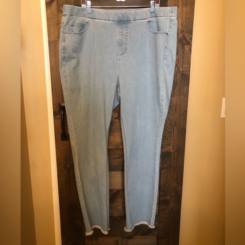 Premium light wash stretch denim jeans by Isaac Mizrahi